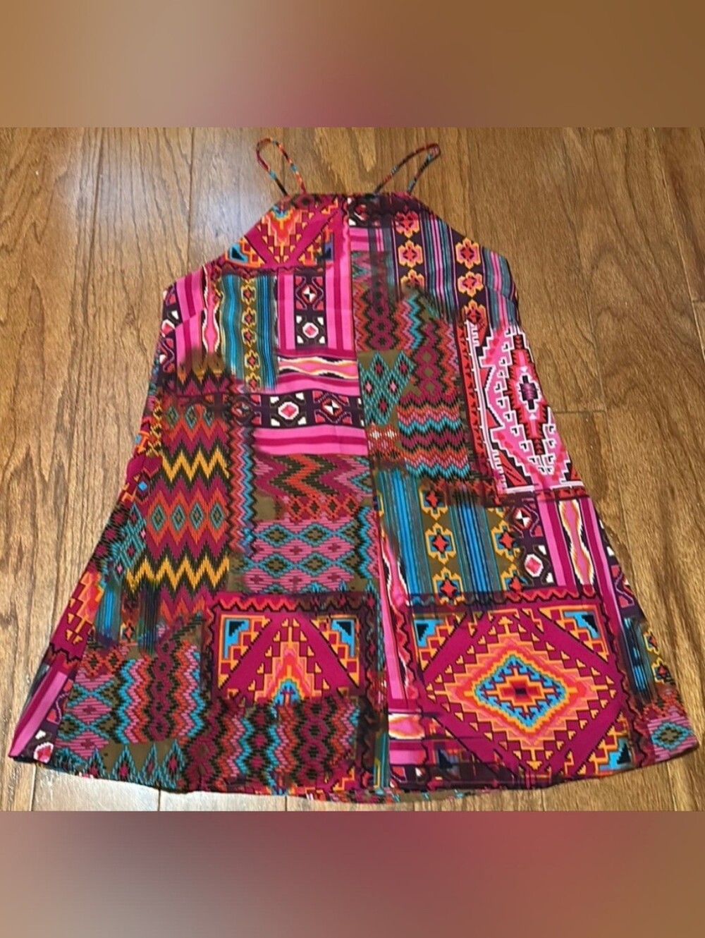 Pearle 88 sundress features a vibrant, patchwork-style design blending tribal